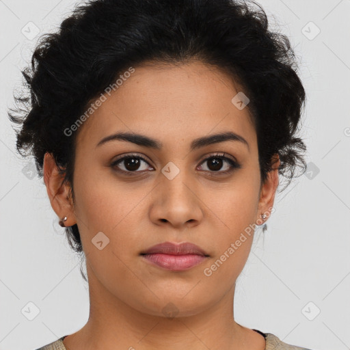 Joyful latino young-adult female with short  brown hair and brown eyes