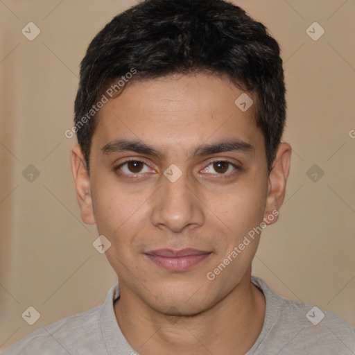 Joyful latino young-adult male with short  brown hair and brown eyes