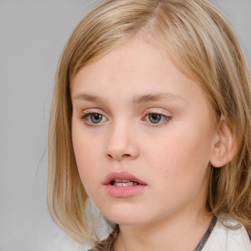 Neutral white child female with long  brown hair and blue eyes