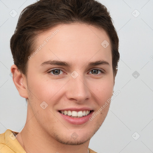 Joyful white young-adult female with short  brown hair and grey eyes