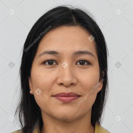 Joyful latino young-adult female with medium  brown hair and brown eyes