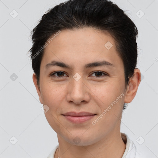 Joyful white young-adult female with short  brown hair and brown eyes