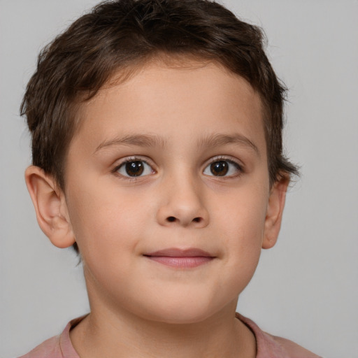 Joyful white child female with short  brown hair and brown eyes