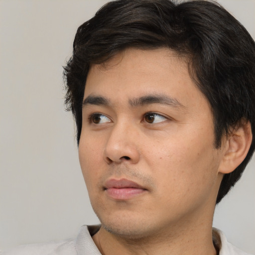 Neutral white young-adult male with short  black hair and brown eyes