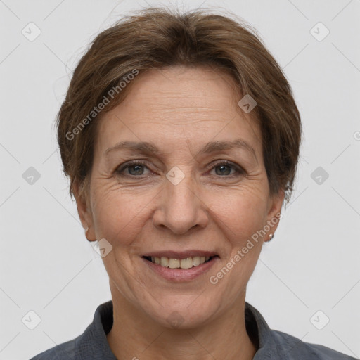 Joyful white adult female with short  brown hair and brown eyes