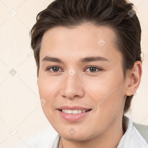 Joyful white young-adult female with short  brown hair and brown eyes