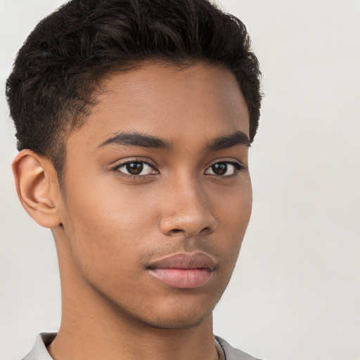 Neutral latino young-adult male with short  brown hair and brown eyes