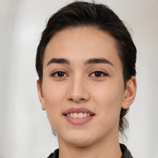 Joyful white young-adult female with medium  brown hair and brown eyes