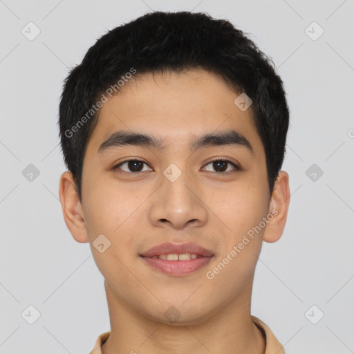 Joyful asian young-adult male with short  black hair and brown eyes