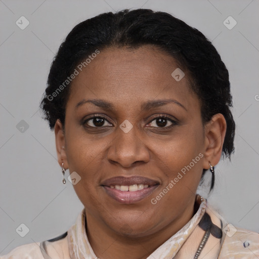 Joyful latino adult female with short  brown hair and brown eyes