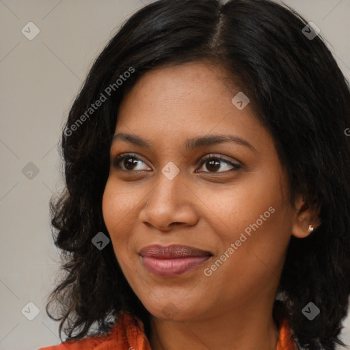 Joyful black young-adult female with medium  black hair and brown eyes