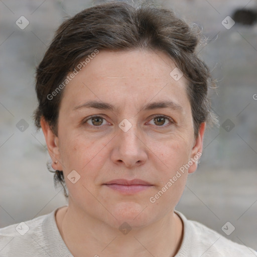 Joyful white adult female with short  brown hair and brown eyes