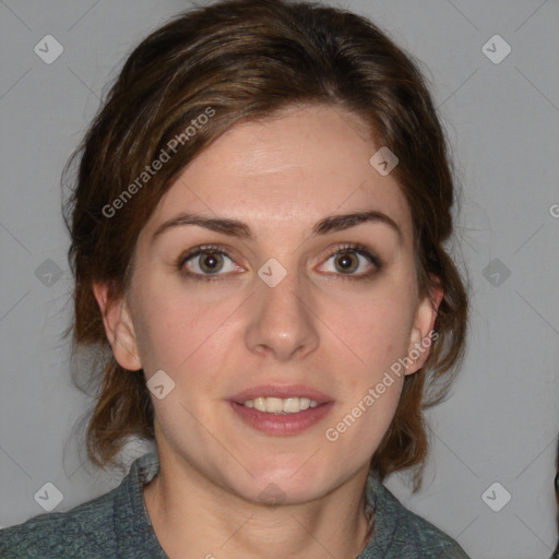 Joyful white young-adult female with medium  brown hair and blue eyes