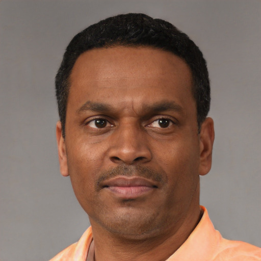 Neutral black adult male with short  black hair and brown eyes