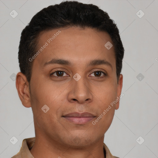 Joyful latino young-adult male with short  brown hair and brown eyes
