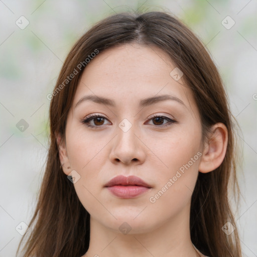 Neutral white young-adult female with long  brown hair and brown eyes