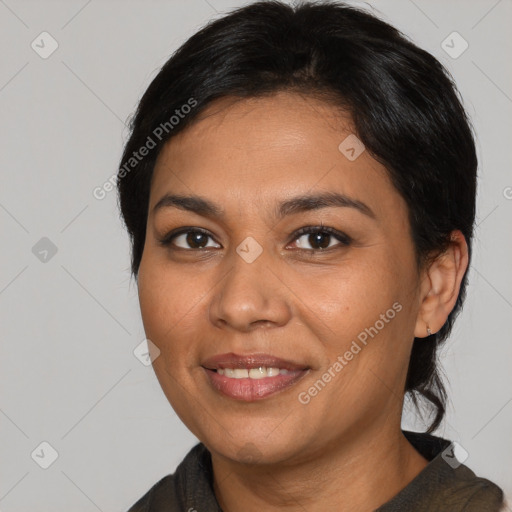 Joyful asian young-adult female with medium  black hair and brown eyes