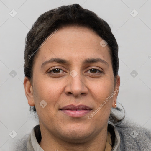 Joyful white adult female with short  brown hair and brown eyes