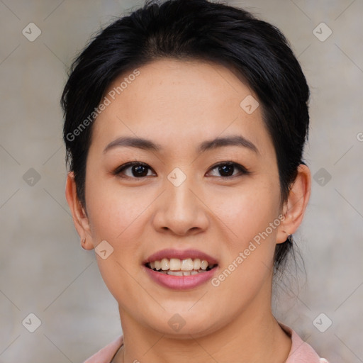 Joyful asian young-adult female with short  black hair and brown eyes