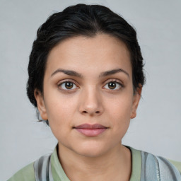 Neutral white young-adult female with short  brown hair and brown eyes