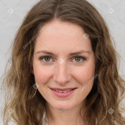 Joyful white young-adult female with long  brown hair and green eyes