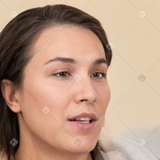 Neutral white young-adult female with long  brown hair and brown eyes