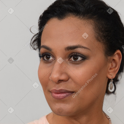 Joyful latino young-adult female with short  brown hair and brown eyes