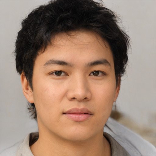 Neutral asian young-adult male with short  brown hair and brown eyes