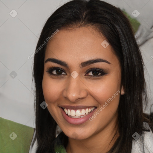 Joyful latino young-adult female with medium  brown hair and brown eyes