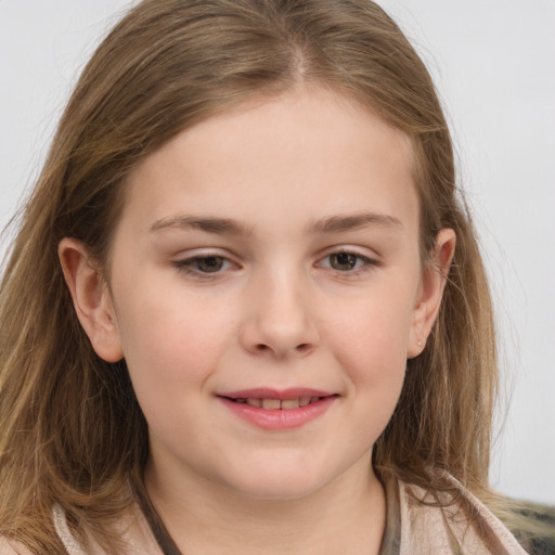 Joyful white child female with long  brown hair and brown eyes