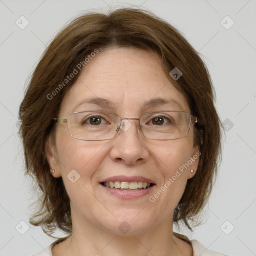 Joyful white adult female with medium  brown hair and grey eyes