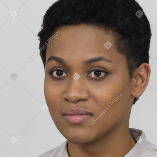 Joyful black young-adult female with short  black hair and brown eyes