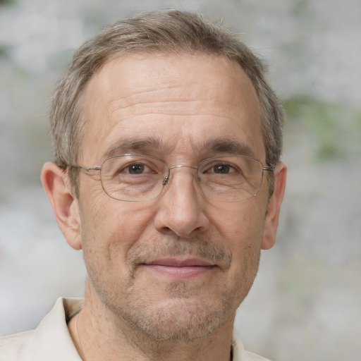 Joyful white middle-aged male with short  brown hair and brown eyes