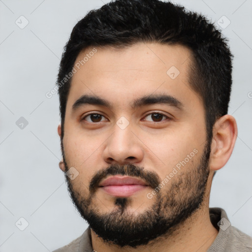 Neutral latino young-adult male with short  black hair and brown eyes