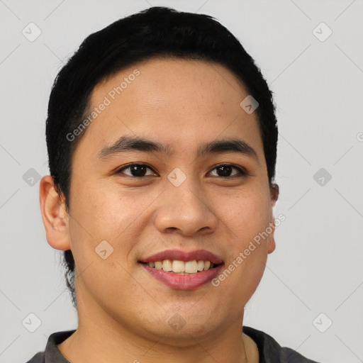 Joyful latino young-adult male with short  black hair and brown eyes