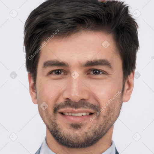 Joyful white young-adult male with short  black hair and brown eyes