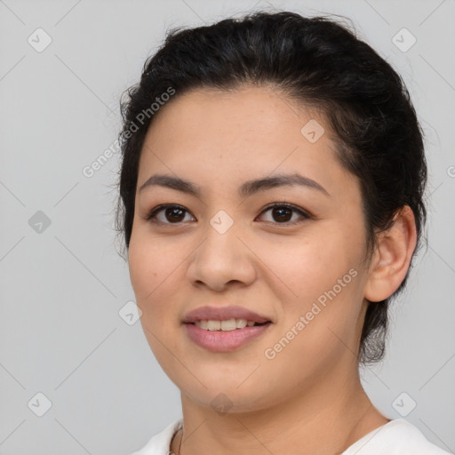 Joyful asian young-adult female with medium  black hair and brown eyes