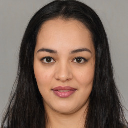 Joyful asian young-adult female with long  brown hair and brown eyes