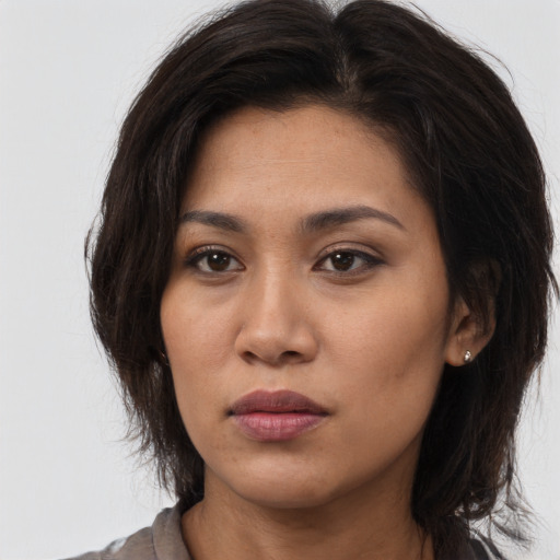 Neutral asian young-adult female with long  brown hair and brown eyes
