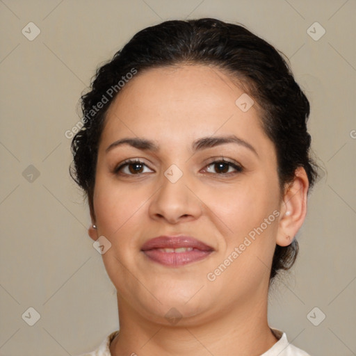 Joyful latino young-adult female with short  brown hair and brown eyes