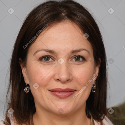 Joyful white adult female with medium  brown hair and grey eyes