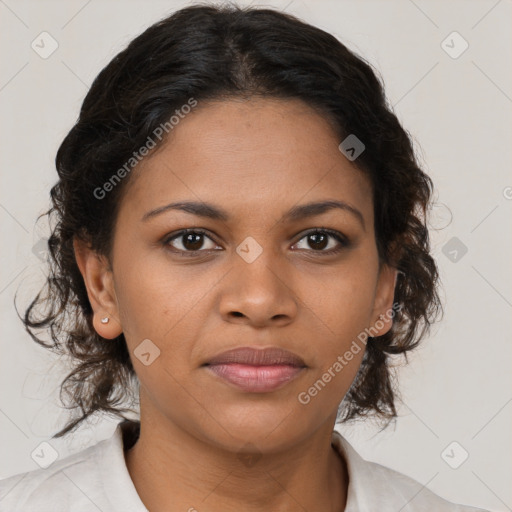 Joyful black young-adult female with medium  brown hair and brown eyes