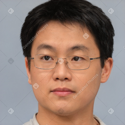 Neutral asian adult male with short  brown hair and brown eyes