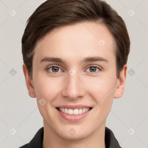 Joyful white young-adult female with short  brown hair and grey eyes