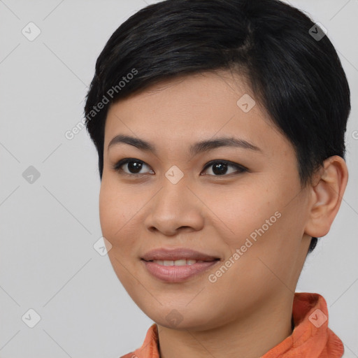 Joyful asian young-adult female with medium  black hair and brown eyes