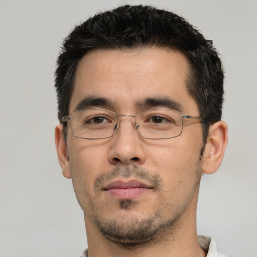 Neutral white adult male with short  black hair and brown eyes