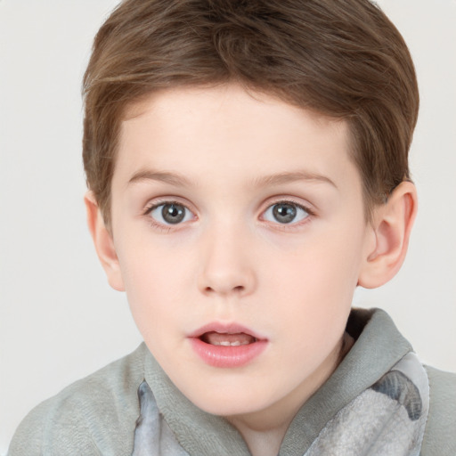 Neutral white child male with short  brown hair and grey eyes