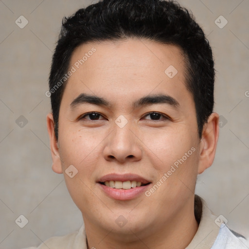 Joyful asian young-adult male with short  brown hair and brown eyes