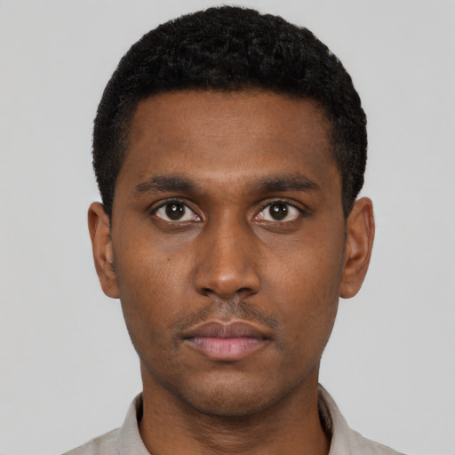 Neutral black young-adult male with short  black hair and brown eyes