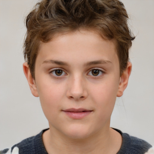 Joyful white child male with short  brown hair and brown eyes